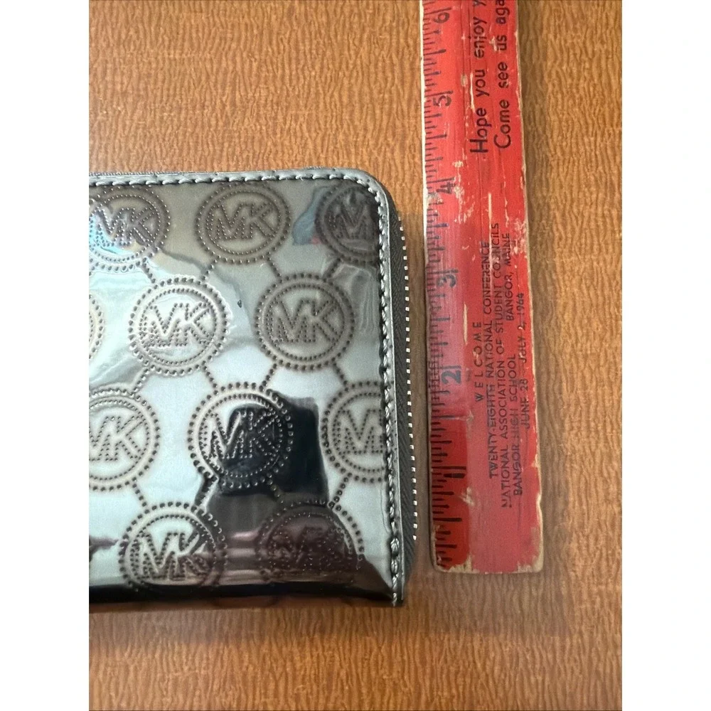 Michael Kors MK Signature Metallic Silver Zip Around Wallet